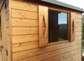 Ventana lateral del cobertizo Robin